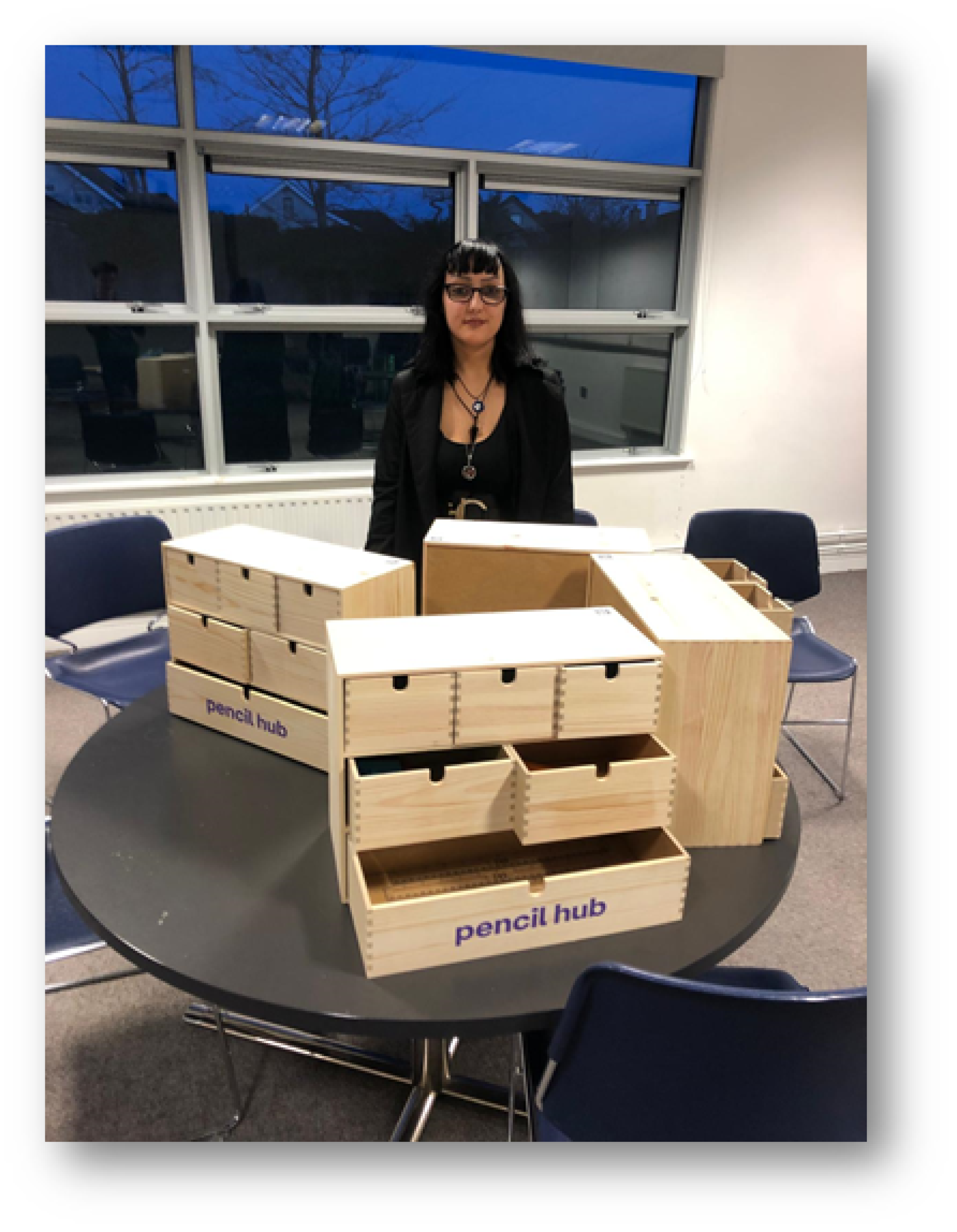 Person standing with boxes